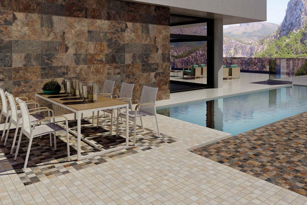 Outdoor stone effect tiles near swimming pool.