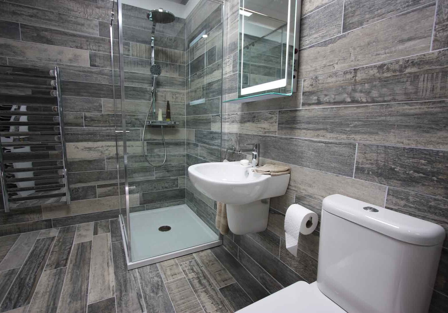 Bathroom tiles with sink and shower. Bathroom tiles with sink and shower.